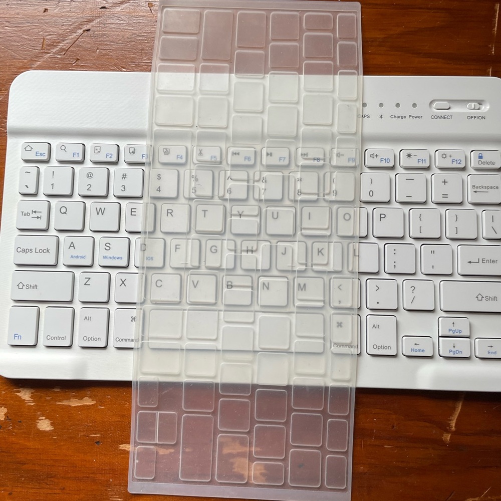 White Wireless Keyboard with Clear Silicone Cover